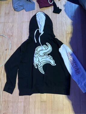 Men's Black Hoodie with White Hood & Sleeve Featuring Vikings Graphic